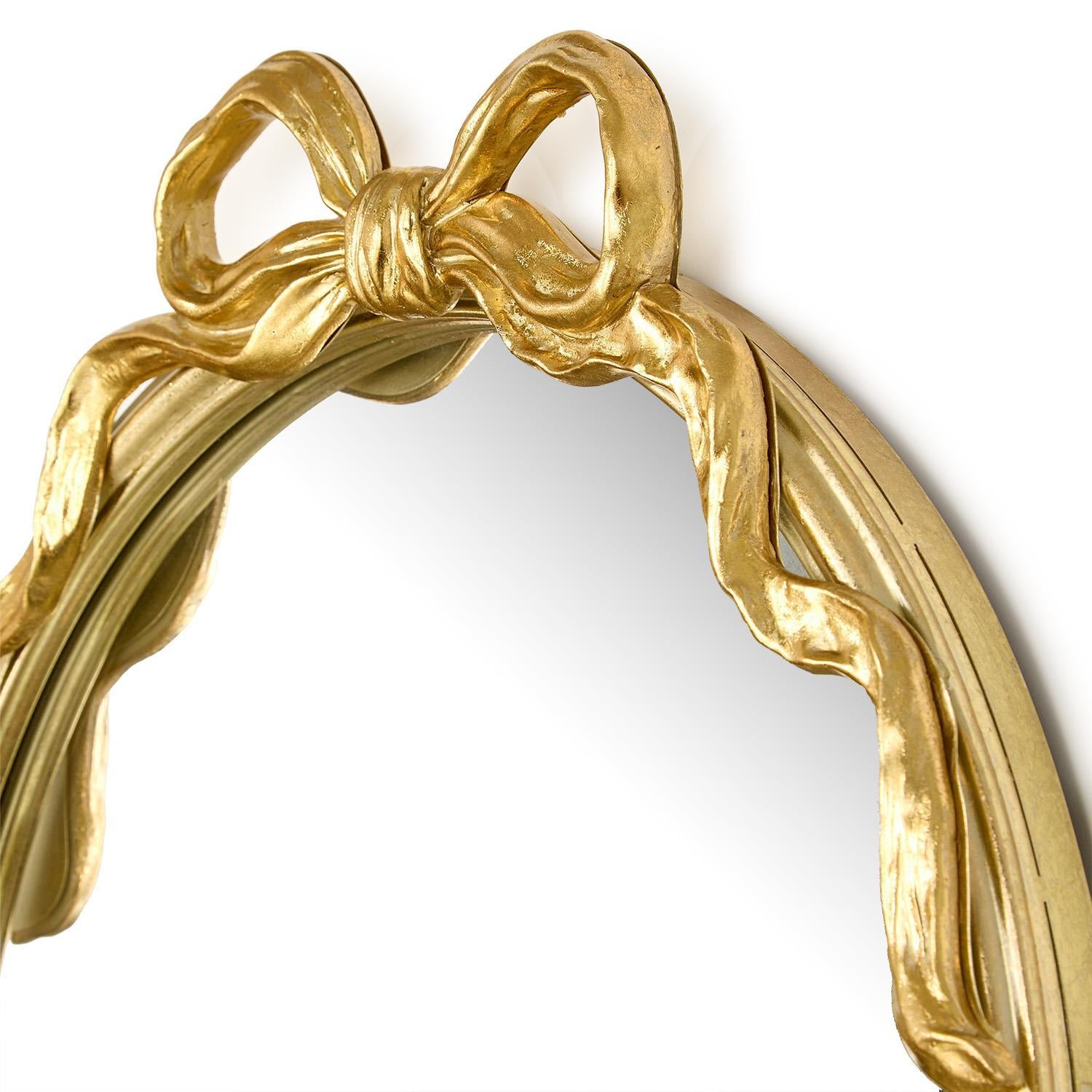 Gold Oval Mirror with Bow Accent