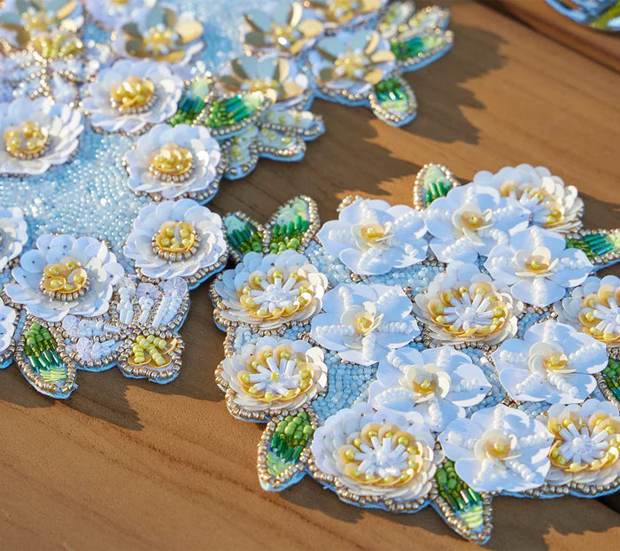 Kim Seybert Gardenia Drink Coasters in Sky, White & Yellow, Set of 4 in a Gift Bag
